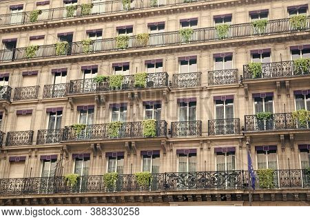 Facade Building With Windows And Balconies. Architecture And Design Concept. European Architecture. 