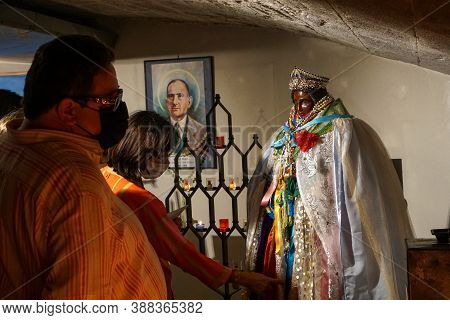 Saintes Maries De La Mer - 09/04/2020: Believers Touching The Veils Of Saint Sarah Statue