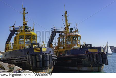 Two Tugs Boat Stands Ready To Help Ships In The Port Of Bari
