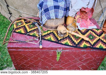 Household Items Of Nomadic Peoples. Portable Dwelling Tribes Whip, Spoon And Cup. The Tent Housing T