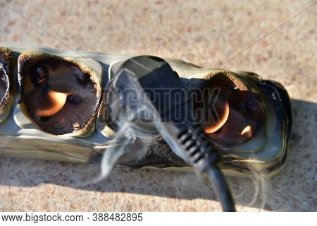 Outlets With Switche Caught Fire In Room. Overloaded Electrical Current Or Short In Device From Many