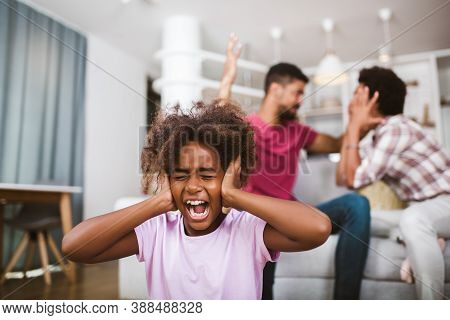 Sad, Desperate African American Girl During Parents Quarrel, She Clog The Ears At Home, Angry Parent