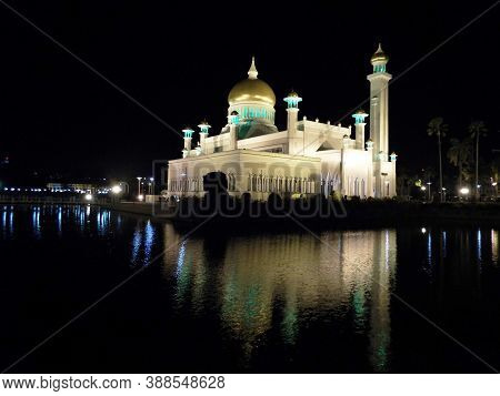 Bandar Seri Begawan, Brunei, January 27, 2017: Reflections In The Water Of The Lake Of The Sultan Om