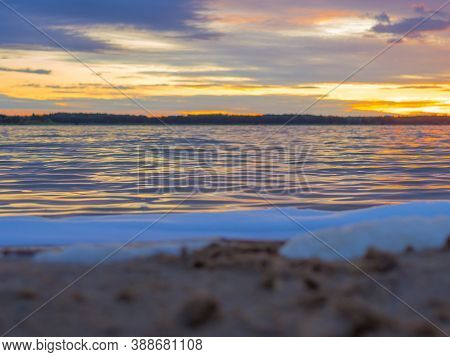 Panoramic View Of Evening Sunset Lake With Green Trees, Mist And Tranquil Reflection. Estonia, Harku