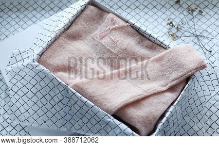 Textile Things Are Knitted, Cotton Folded According To The Method Of Konmari. Concept Order, Comfort