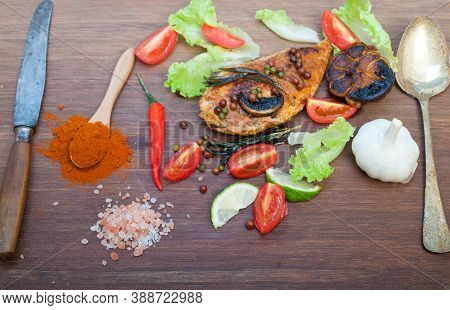 Wood Fired Hoven Cooked Chicken Breast On Wood Board