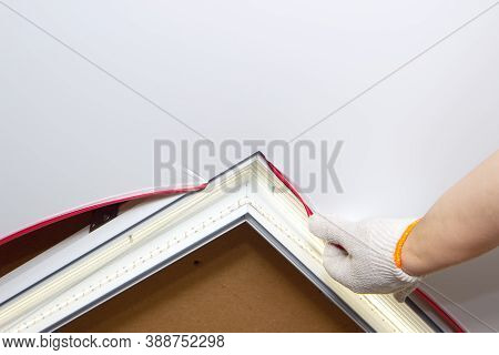 Laser Level On The Ceiling.blue Laser Level Tool. Installing Of Stretch Ceiling.