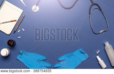Medical Equipment Stethoscope, Syringe, Thermometer And Notebook On Pastel Blue Color, Healthcare An