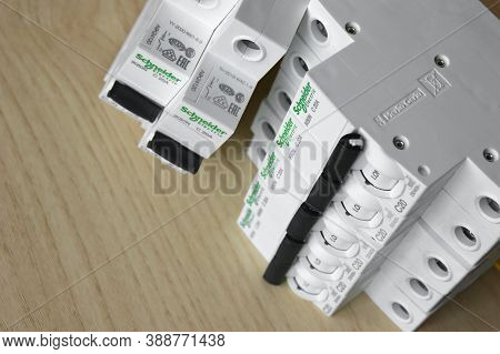 Kharkov, Ukraine - September 22, 2020 : Schneider Electric Circuit Breakers On Light Wood Background