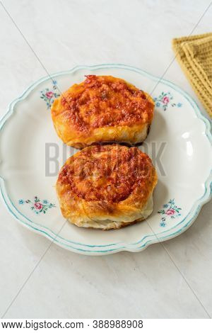 Turkish Traditional Food Borek Manti With Minced Meat, Tomato Paste And Yogurt / Yoghurt Burek Dumpl