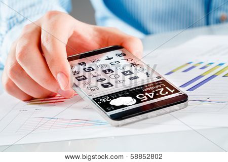 Smartphone (phablet) with a transparent display in human hands. Concept actual future innovative ideas and best technologies humanity.