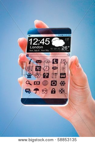 Smartphone (phablet) with a transparent display in human hands on a blue background. Concept actual future innovative ideas and best technologies humanity.