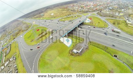 Bridge of Abramtsevskaya overpass on Moscow beltway at dull day. View from unmanned quadrocopter