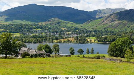 Coniston Water and mountains Lake District England uk blue sky