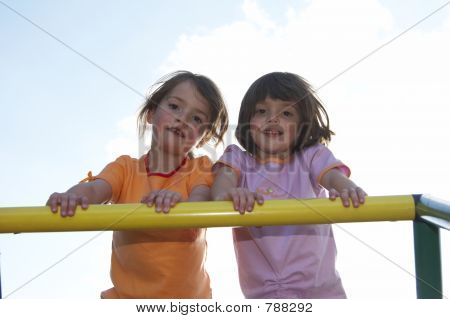 twins on climbing pole 01