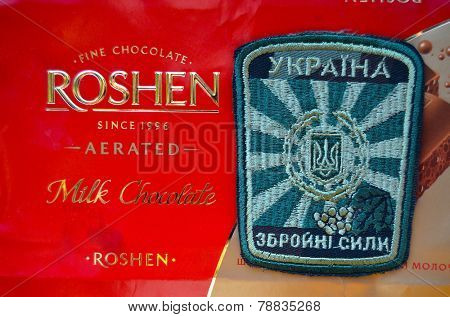 Kiev,Ukraine.Dec 20.Illustrative editorial. Chevron of Ukrainian Army.With logo Roshen Inc. Trademark Roshen is property of ukrainian president Poroshenko.At December 20,2014 in Kiev, Ukraine