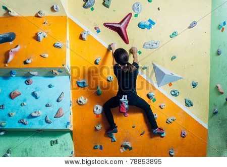 Girl Climbing Up On Wall Indoor