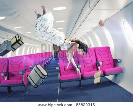 Flying  girl in an airplane. Creative concept 