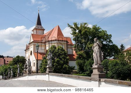 View of the old Baroque bridge and St. John the Baptist church in Namest nad Oslavou