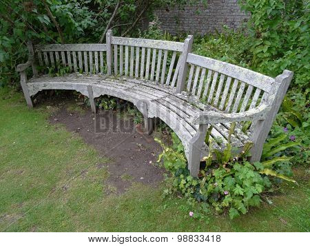 Curved Bench Within Walled Garden