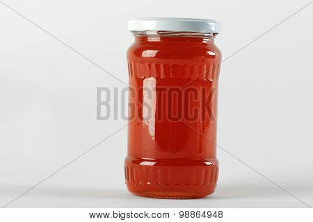 Honey Jar. Honey Tidbit In Glass Jar And Honeycombs Wax.
