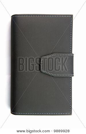 isolado do caderno de titular de couro falso preto no branco