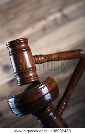Auction and business concept.  Gavel on the wooden background.