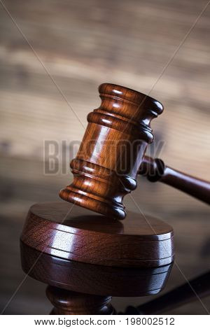 Gavel. Auction and business concept. Wooden background.