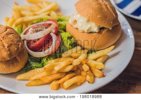 Greek Food Concept. Bun With Chicken Salad, French Fries