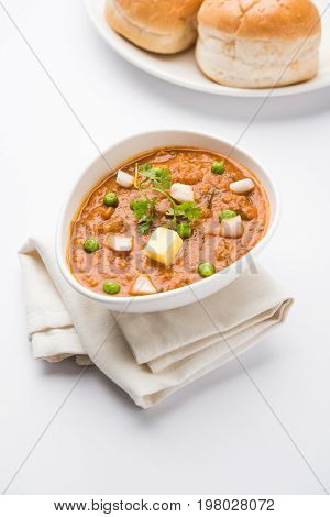 Pav bhaji or pavbhaji - popular Indian street food, selective focus