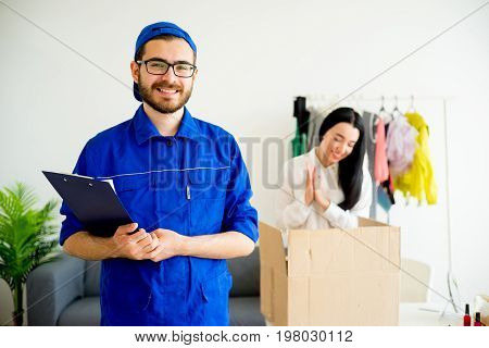 A portrait of a smiling handsome deliveryman