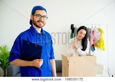 A portrait of a smiling handsome deliveryman