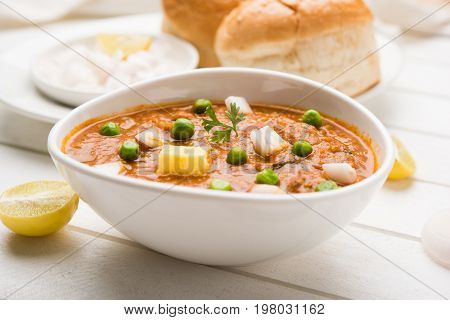 Pav bhaji or pavbhaji - popular Indian street food, selective focus