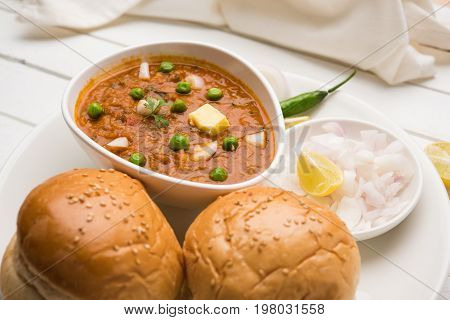 Pav bhaji or pavbhaji - popular Indian street food, selective focus