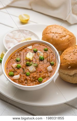 Pav bhaji or pavbhaji - popular Indian street food, selective focus