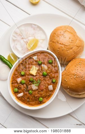 Pav bhaji or pavbhaji - popular Indian street food, selective focus