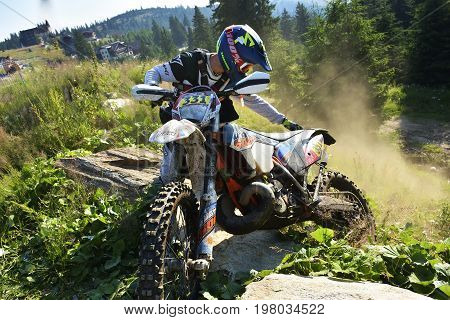 Sibiu, Romania - July 12 - 16 July: Copetitors In Red Bull Romaniacs Hard Enduro Rally With A Ktm Mo