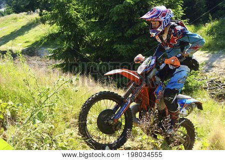 Sibiu, Romania - July 12 - 16 July: Copetitors In Red Bull Romaniacs Hard Enduro Rally With A Ktm Mo
