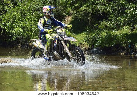 Sibiu, Romania - July 12 - 16 July: Copetitors In Red Bull Romaniacs Hard Enduro Rally With A Ktm Mo