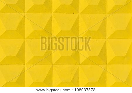 Texture Of The Relief Surface Of A Yellow Concrete Fence