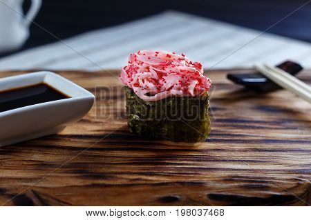 Appetizing One Nigiri Sushi With Spicy Crab Meat And Caviar Serv