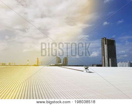 roof of metal sheet building with clear blue sky background