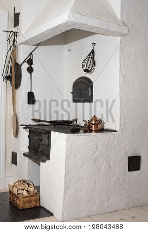 Vintage wood stove and a baking place