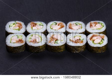 Futomaki Sushi Roll With Redfish, Omelet And Cucumber Served On