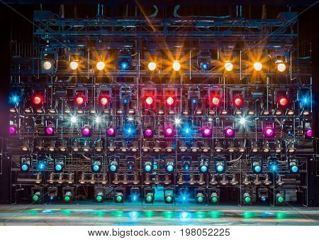 Spotlights & lighting equipment for the theater. Multi-colored lights.