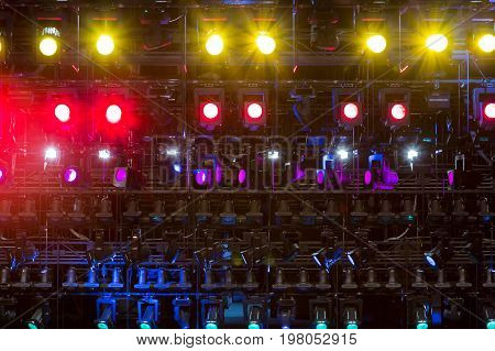 Lighting equipment on the stage. Multi-colored lights.