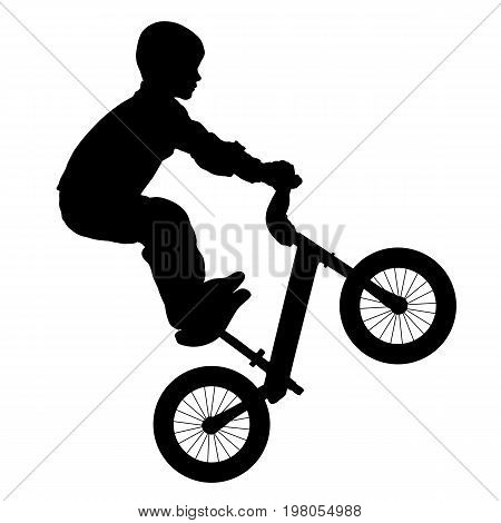 Children's balance bicycle child performs a trick on a bike silhouette vector