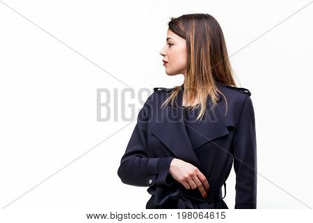 Young Woman Turning To Stare At The Camera