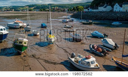 Boats at low tide in Minehead harboard Minehead Somerset UK.