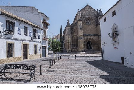 Cordoba, SPAIN - July 9, 2017: Church of Santa Marina, catholic temple site in the city of Cordoba, it is placed opposite to the monument to the toreador Manolete, Andalusia, Spain